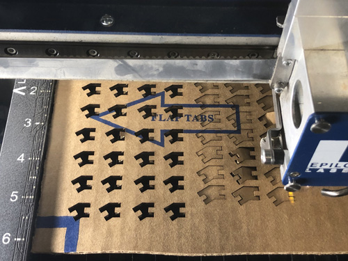Laser cutter cutting connector pieces