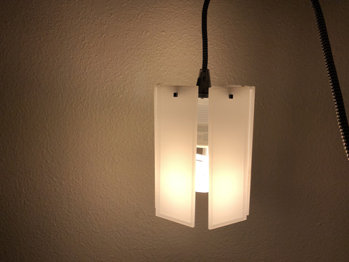 acrylic pieces mounted on the 3D printed mount with a lightbulb inside